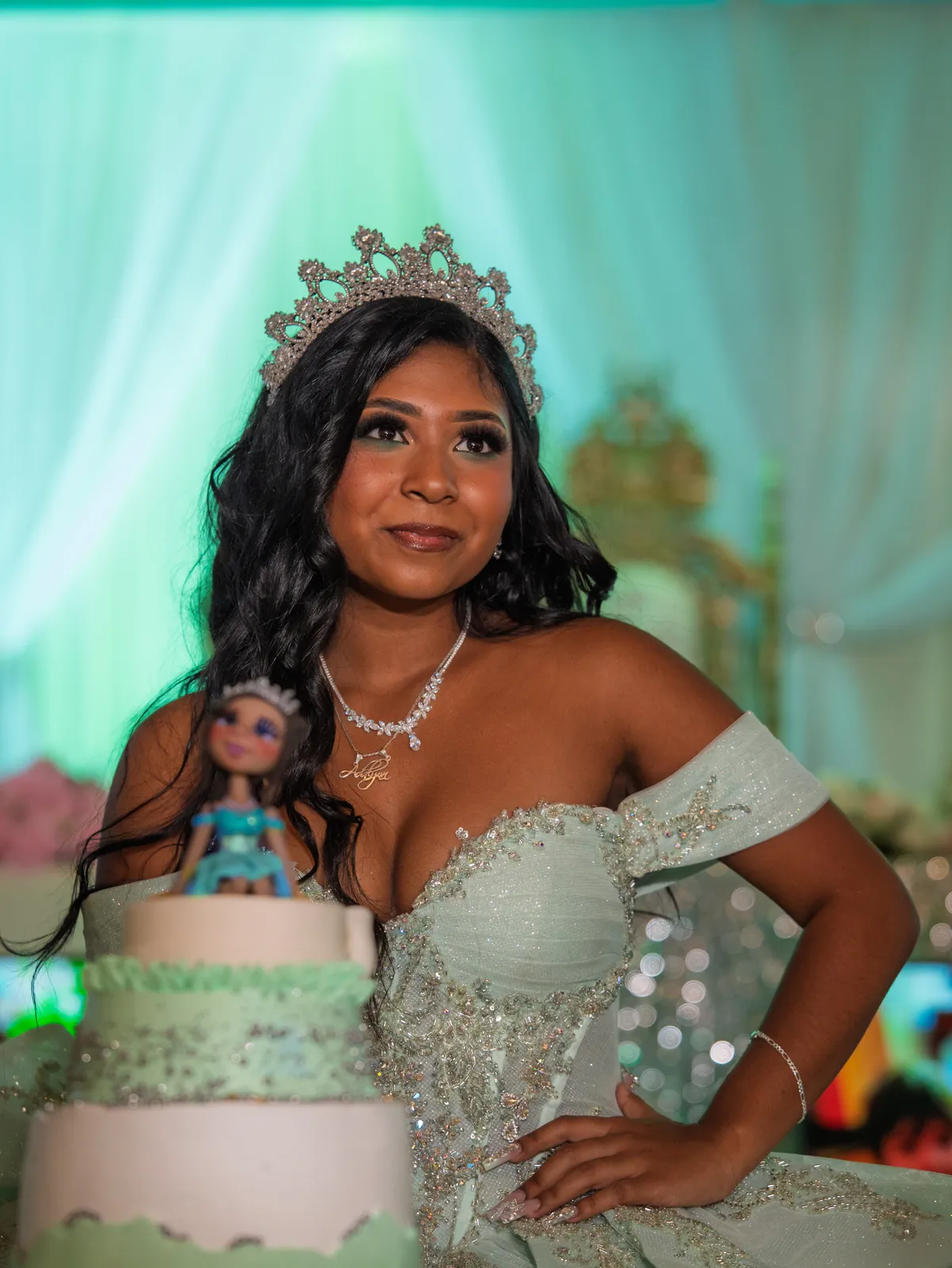 Quinceañera with her cake